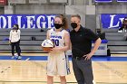 Mikayla Pucci 1000th  Wheaton College women's basketball’s Mikayla Pucci is honored after scoring her 1000th career point. - Photo By: KEITH NORDSTROM : Wheaton, basketball, Mikayla Pucci, 1000th